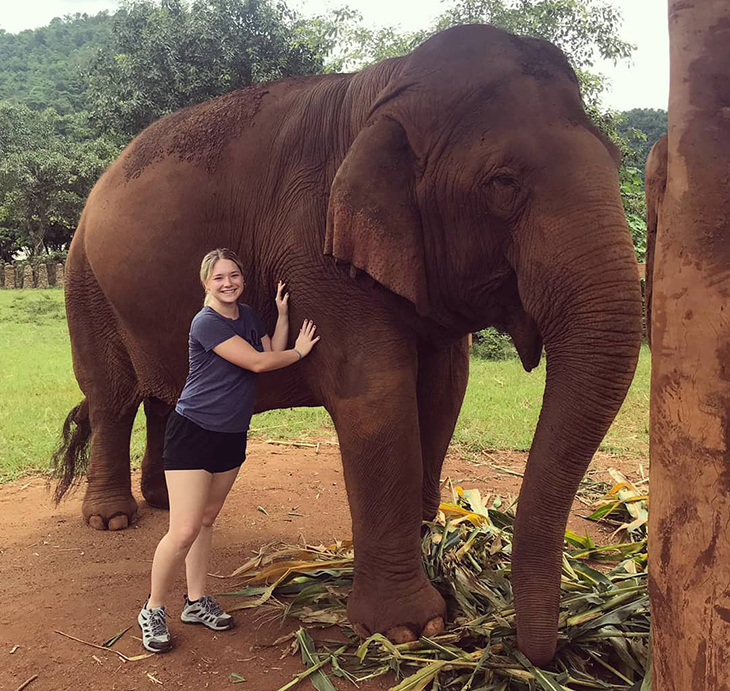Amber Shelly with elephant in Thailand